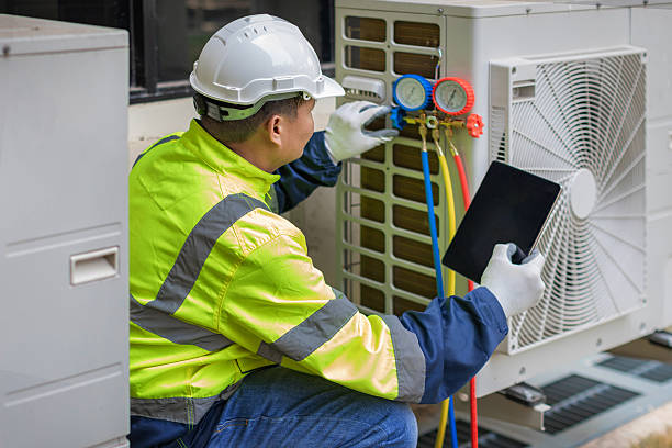 Professional Air Duct Cleaning technician working in Carmichaels, PA